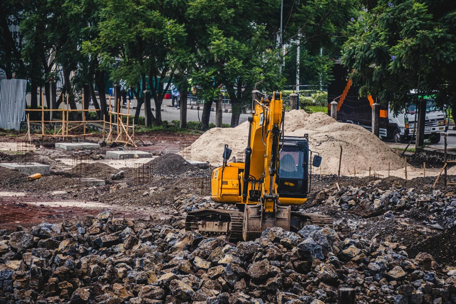 Yellow tracked excavator on an Australian construction site